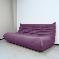 Purple three-seater sofa